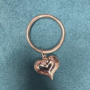 Silver heart on a ring